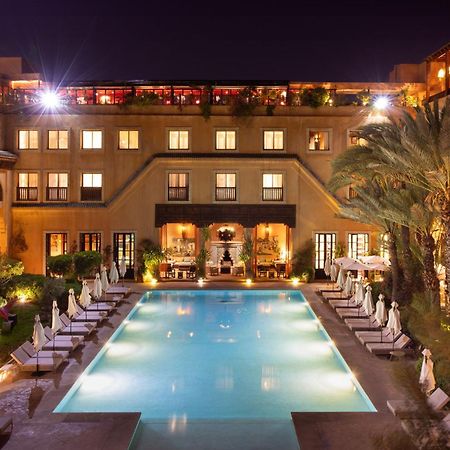 레 자르댕 드 라 쿠투비아 마라케시 외부 사진 The swimming pool at the hotel
