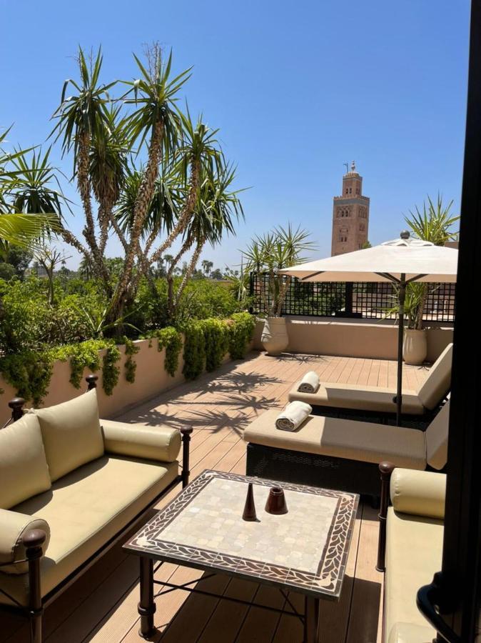 레 자르댕 드 라 쿠투비아 마라케시 외부 사진 Rooftop terrace at the Four Seasons Hotel in Marrakech, Morocco