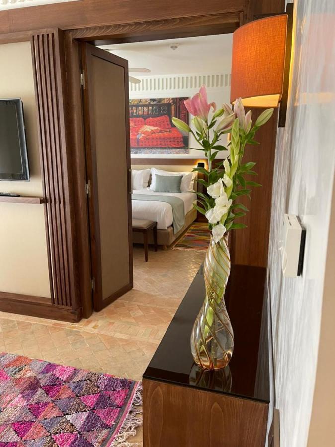 레 자르댕 드 라 쿠투비아 마라케시 외부 사진 A room at the hotel