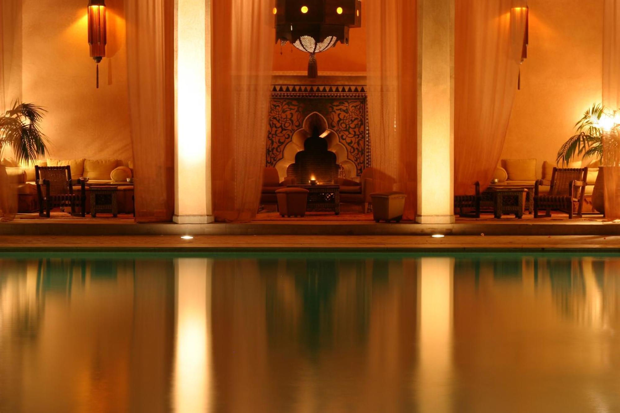 레 자르댕 드 라 쿠투비아 마라케시 외부 사진 The pool at the Four Seasons Hotel, Marrakech